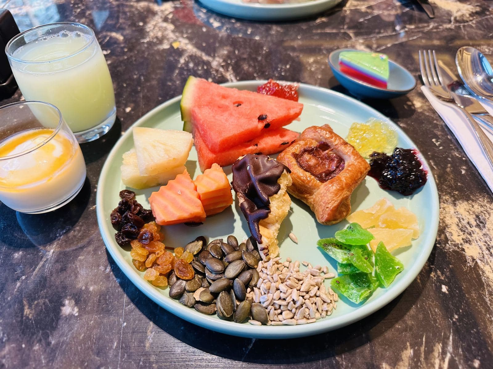 A plate of fresh Thai fruit and sweets