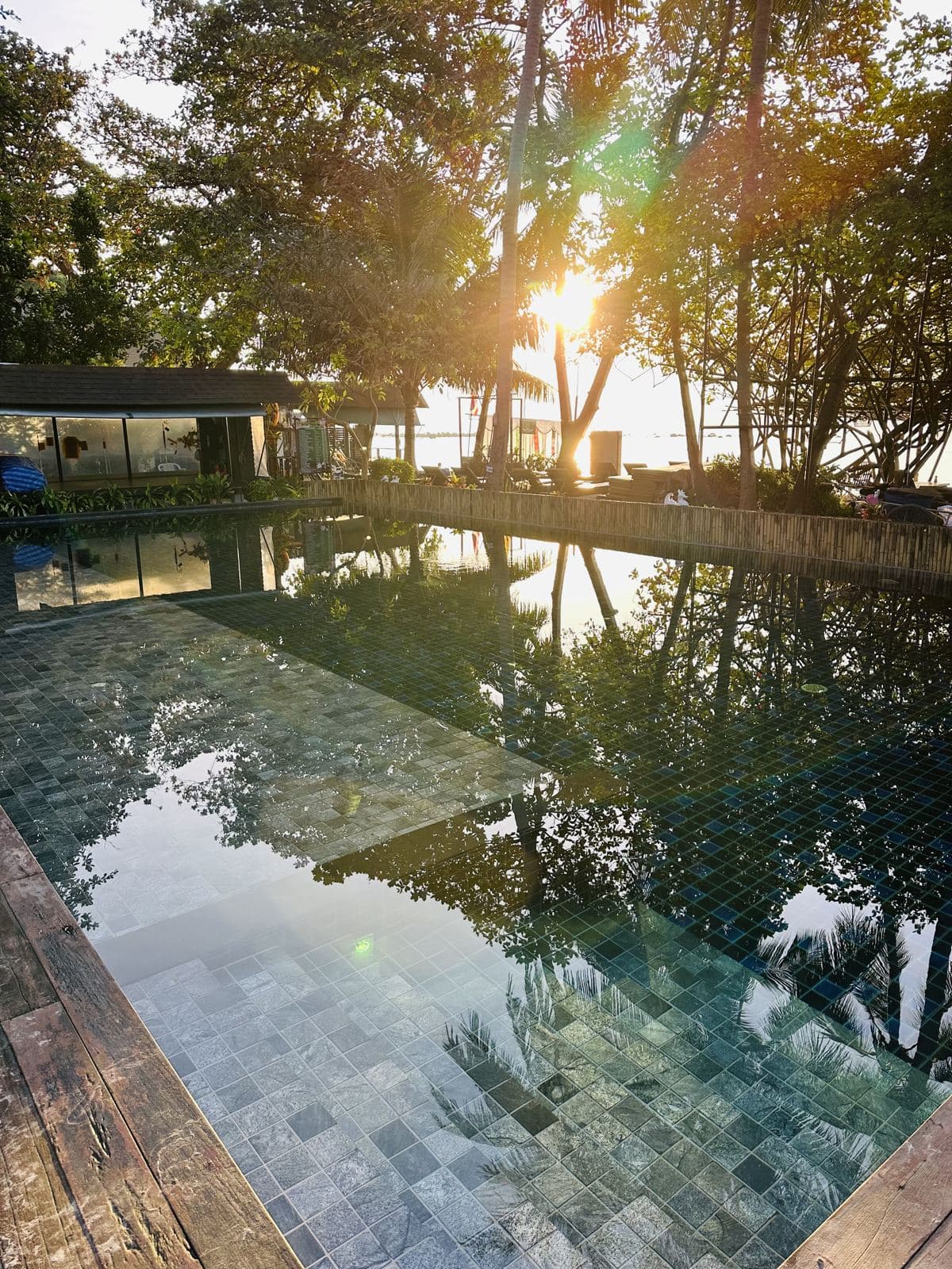 Sunrise reflected in the resort pool