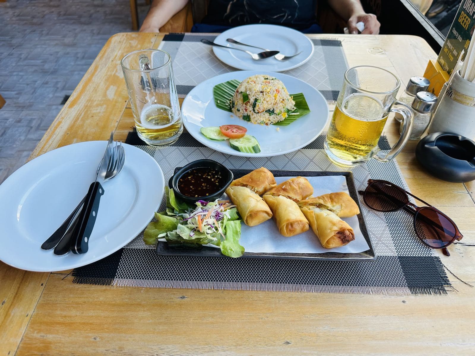 Pineapple fried rice, spring rolls and cold beer