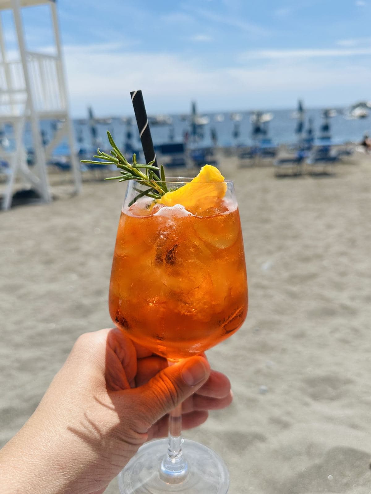 An Aperol spritz on the beach