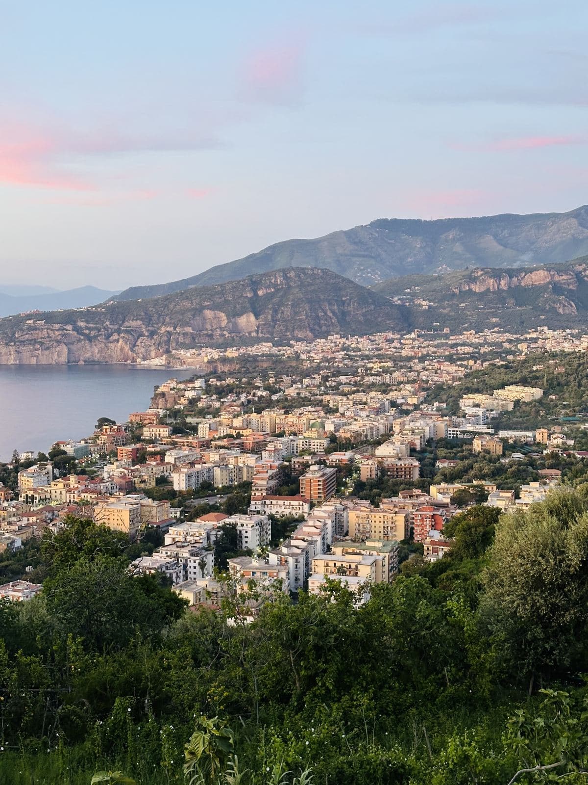 Sorrento at dusk with the mountains behind